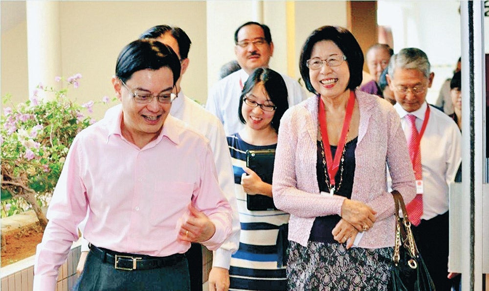 Dr Rosemary Khoo, then-President of NUS Senior Alumni, with “Our Singapore Conversation” Chairman and now-Deputy Prime Minister Mr Heng Swee Keat in 2013.