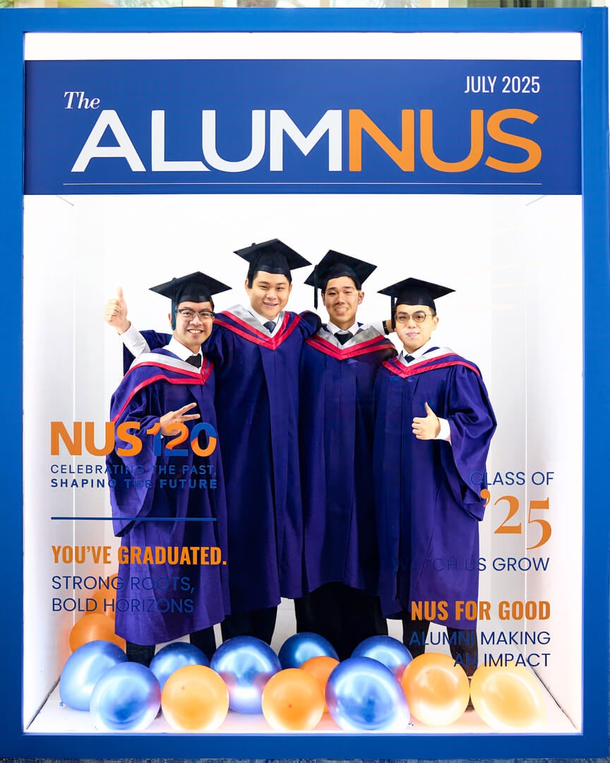 Graduates pose with their friends and family in the photo booth provided by the NUS Office of Alumni Relations.