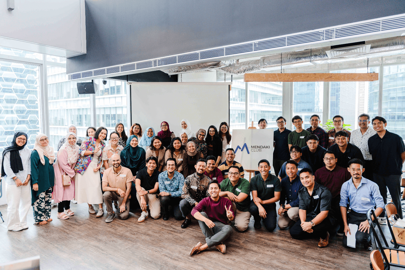 Mr Danial (pictured front) with MENDAKI Club organisers and senior volunteers.